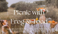 Picnic with Frog & Toad candle label with picnic in a field setting and featuring the scent notes ‘Bergamot,’ ‘Iced Sweet Tea,’ ‘Nutmeg Tarts,' and 'Maple Candies' in decorative serif lettering.